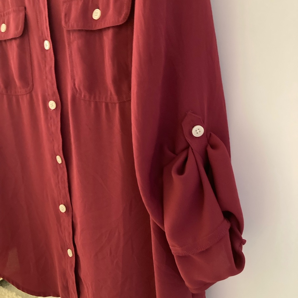 Women’s Loft burgundy red button up polyester blouse.